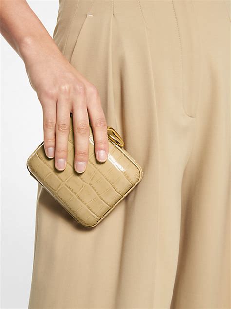 michael kors tina natural clutch embossed leather|tina small python embossed leather minaudière .